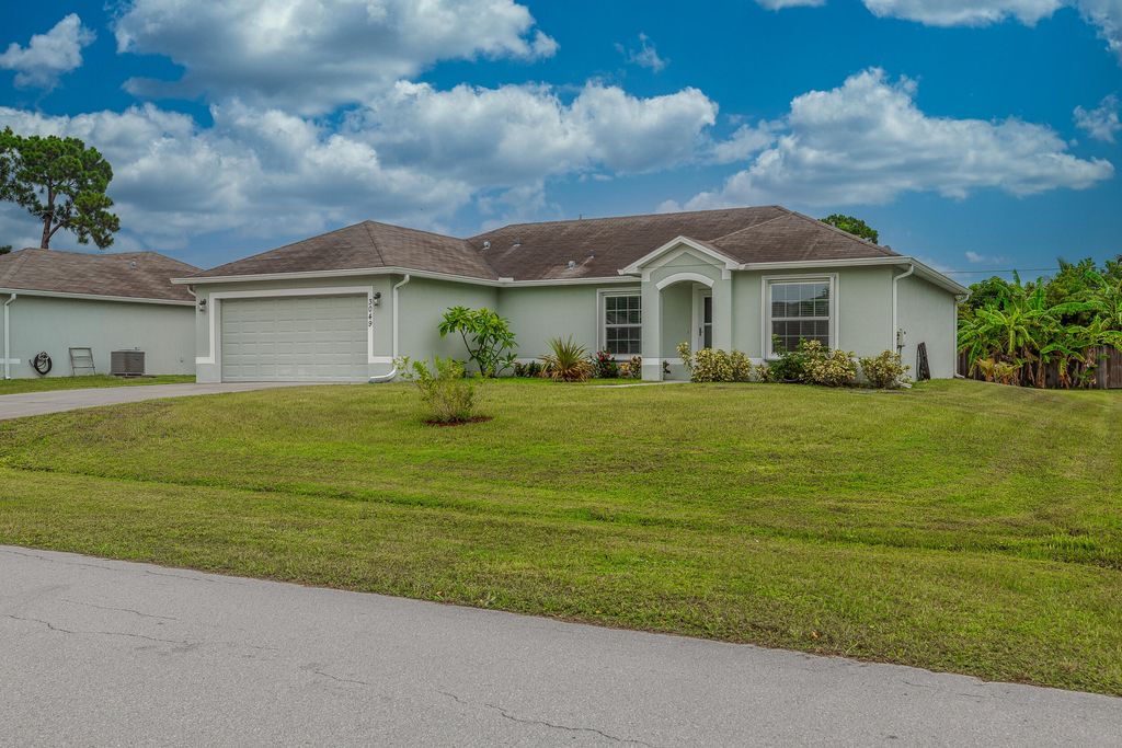 Photo of 3049 SW Lucerne Street, Port Saint Lucie, FL 34953 (MLS # R11108191)
