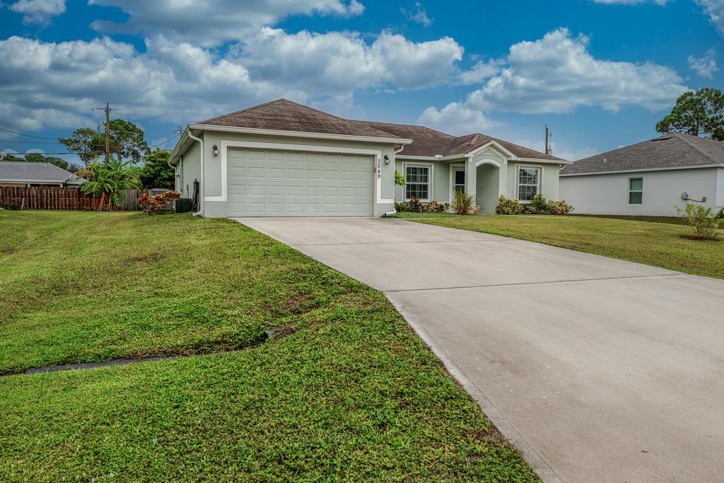 Photo of 3049 SW Lucerne Street, Port Saint Lucie, FL 34953 (MLS # R11108191)