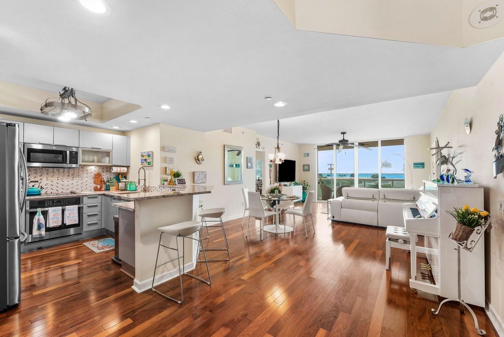 Photo of 2650 Lake Shore Drive #301, Riviera Beach, FL 33404 (MLS # R11167945)