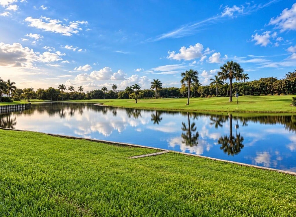 Photo of 442 FRENCH ROYALE Circle, Atlantis, FL 33462 (MLS # B26079177)