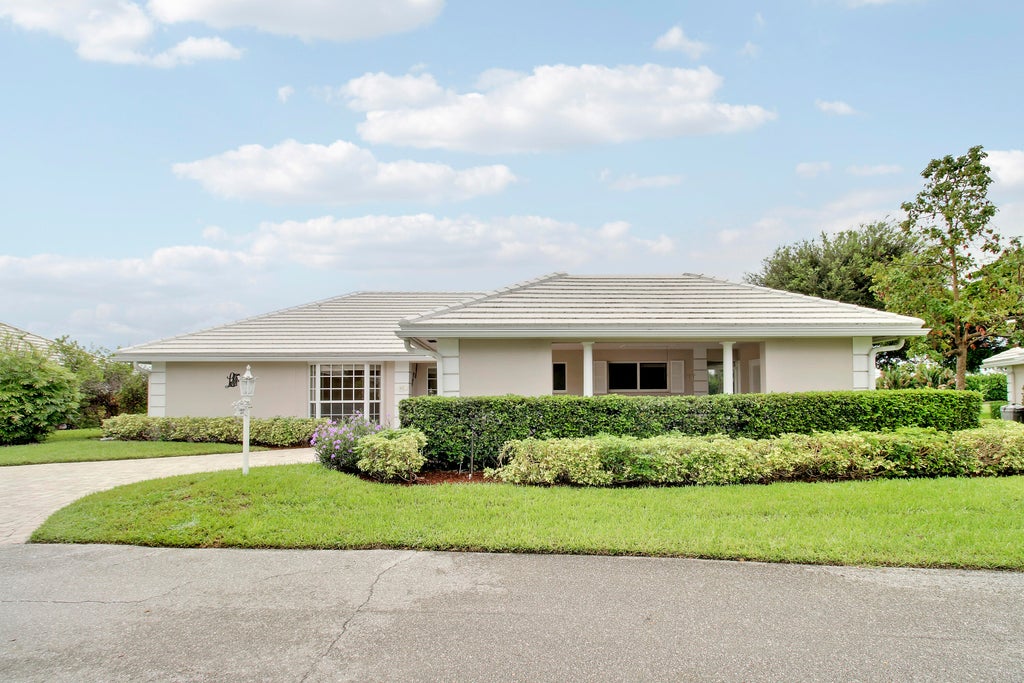 Photo of 442 FRENCH ROYALE Circle, Atlantis, FL 33462 (MLS # B26079177)