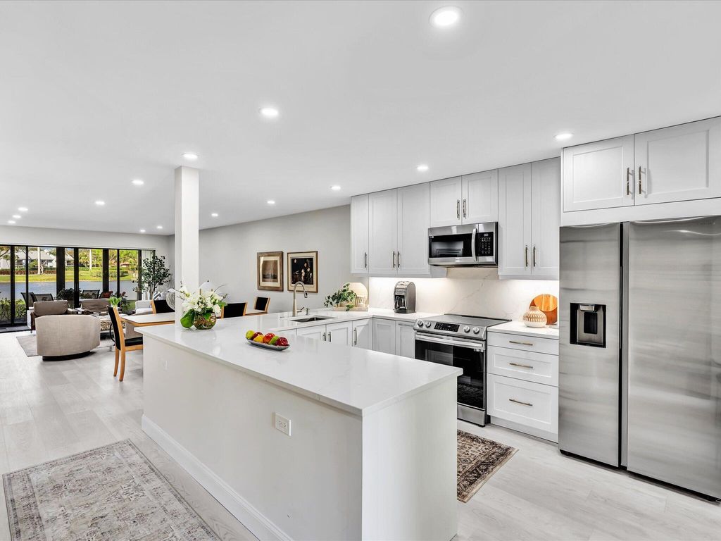 Photo of 5056 Oakhill Ln, Delray Beach, FL 33484 (MLS # B26001146)