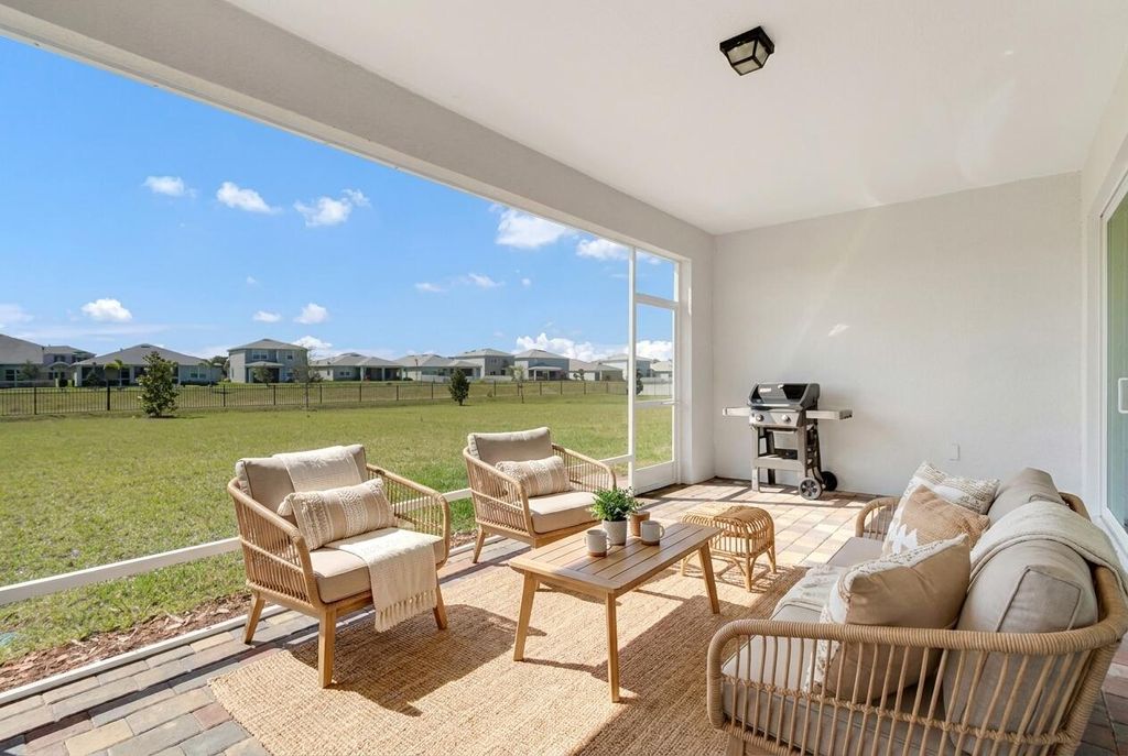 Photo of 10306 SW Green Turtle Lane, Port Saint Lucie, FL 34987 (MLS # B26015666)