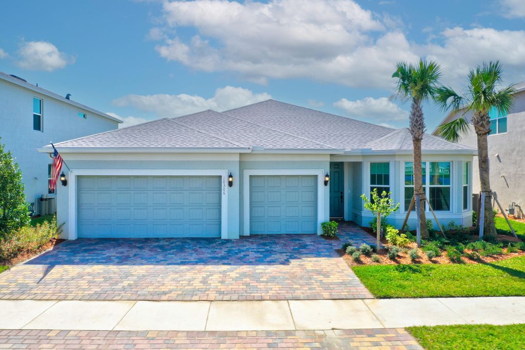 Photo of 10306 SW Green Turtle Lane, Port Saint Lucie, FL 34987 (MLS # B26015666)