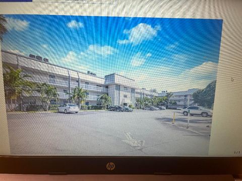 Photo of 3000 Riverside Drive #209, Coral Springs, FL 33065 (MLS # R11115207)