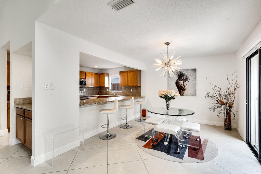 Photo of 1110 Rainwood Circle, Palm Beach Gardens, FL 33410 (MLS # R11029540)