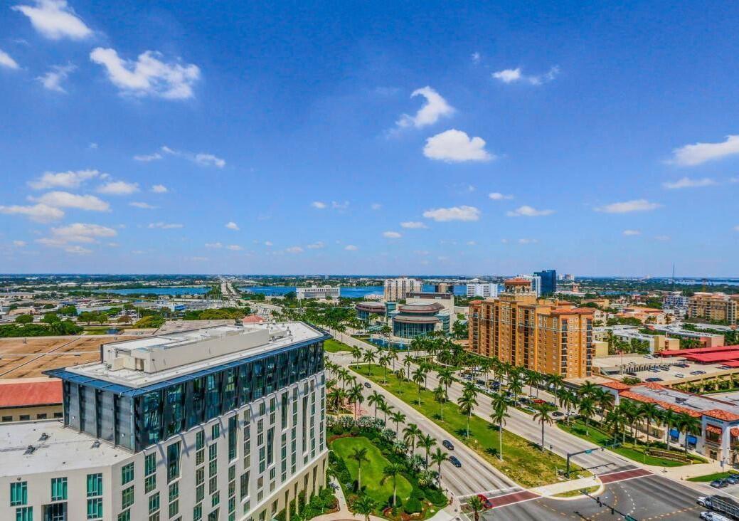 Located on the 18th floor in Cityplace South Tower in West Palm Beach, this west-facing 1 bedroom, 1 bathroom condo offers breathtaking sunset views with a rare oversized terrace perfect for working out, entertaining guest, or taking time to relax. With granite countertops, stainless steel appliances, an in-unit washer and dryer, and a prime reserved parking spot, this condo is matched with a plethora of building amenities: a large gathering room communal kitchen, billiards room, full-service gym, pool, and hot tub. The unit faces away from Okeechobee Blvd, protecting tenants from highway traffic or train noise. City Place South Tower is located near Rosemary Square which has retail stores, restaurtants, a Publix, and the Brightline train for quick access to Ft. Lauderdale or Miami.