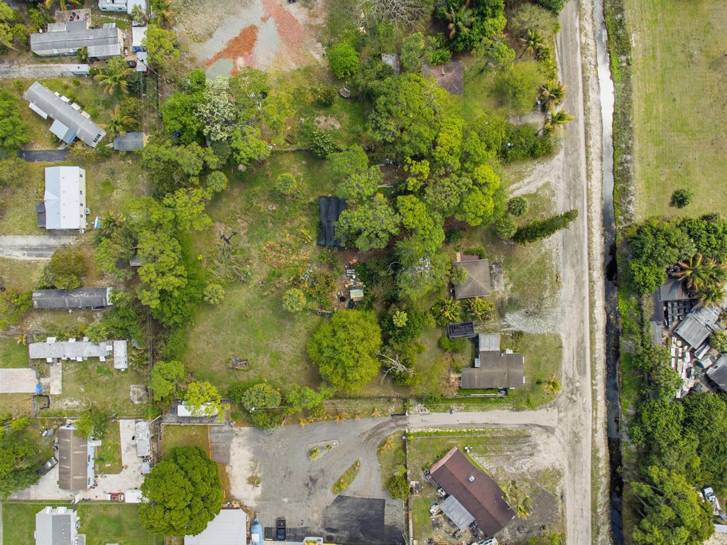 Photo of 5133 Pine Grove Drive N, West Palm Beach, FL 33417 (MLS # B26007254)