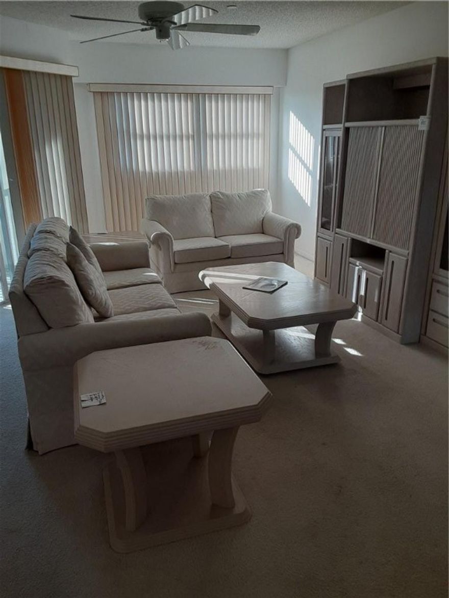 UNBELIEVEABLE TOP FLOOR LONG LAKE VIEW---"YOU CAN SEE FOREVER"--GLASS HURRICANE PROTECTION SLIDER DOORS ON BALCONY ---FURNITURE AS SEEN COMES WITH THE SALE---LIGHT AND BRIGHT UNIT LOCATED IN ONE OF THE NEWEST BUILDINGS IN CENTURY VILLAGE--AMMENITIES GALORE SUCH AS FREE INTERNET, XFINITY ON DEMAND, GARBAGE REMOVAL,WIFI, , CLUB HEALTH,CLUBHOUSE ACTIVITIES, WATER AND SEWER, BUS TRANSPORTATION, BUILDING INSURANCE AND USEAGE OF  THE MAGNIFICENT CLUBHOUSE WITH ALL KINDS OF CLUBS ACTIVITIES AND NEW MOVIES AND FANTISTIC SHOWS AND DANCES