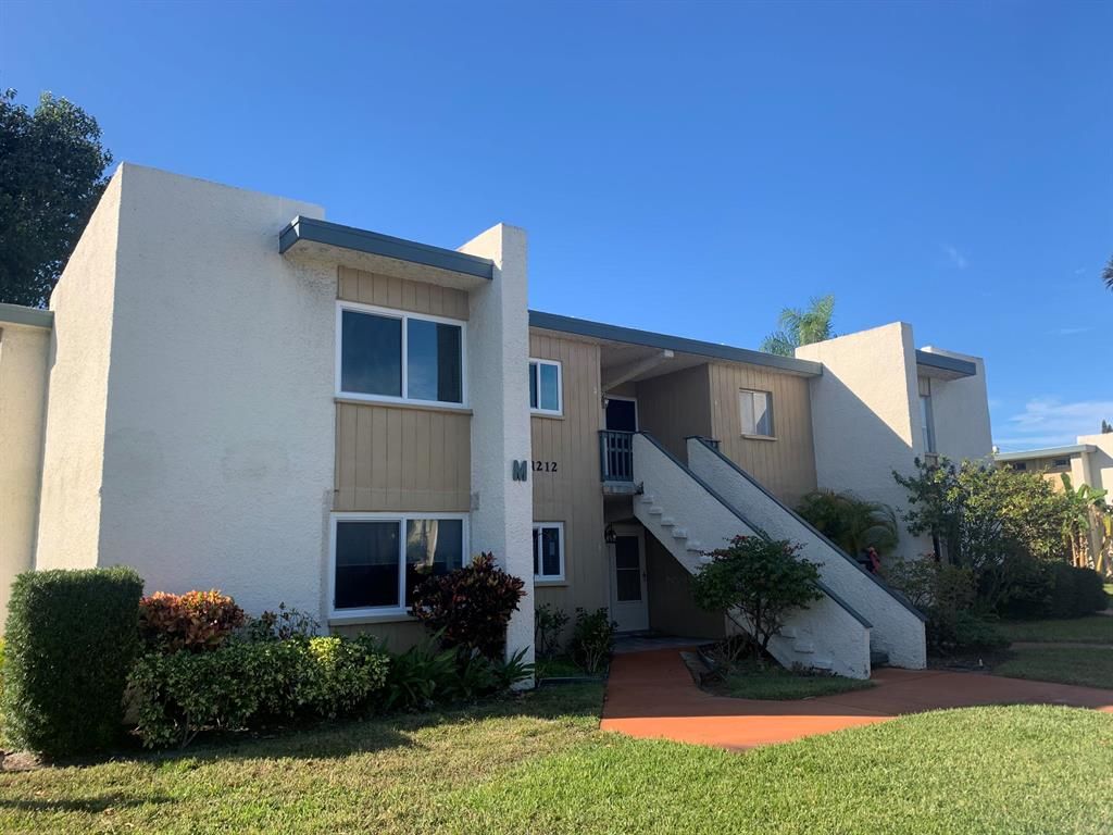 Photo of 1212 NE 14th Court #M-1, Jensen Beach, FL 34957 (MLS # R10680799)