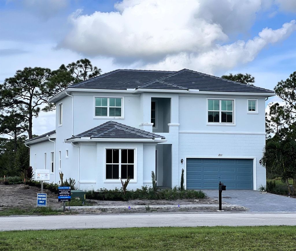 Photo of 211 SE Calmo Circle, Port Saint Lucie, FL 34984 (MLS # R10939398)