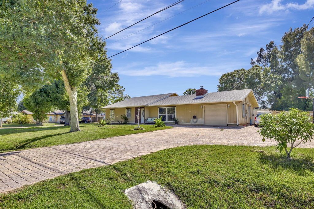 Photo of 5903 Sunset Boulevard, Fort Pierce, FL 34950 (MLS # R11109219)