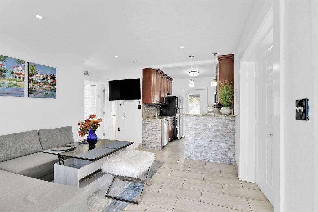 Photo of 1814 NE 53rd Ct, Pompano Beach, FL 33064 (MLS # F10539233)