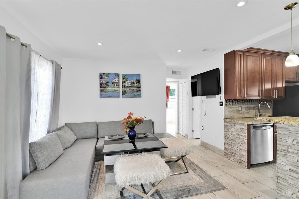 Photo of 1814 NE 53rd Ct, Pompano Beach, FL 33064 (MLS # F10539233)