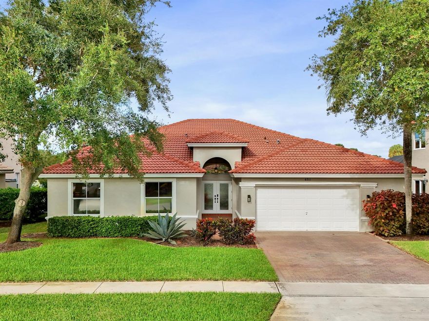 Welcome to your dream home in the highly sought-after Winston Trails! Located in the desirable Shadow Creek Village subdivision, this beautifully updated 4BR, 2.5BA pool home offers nearly 2,400 sq. ft. of living space on a .19-acre canal and golf view lot.Step inside to find a thoughtfully designed Venice floor plan with stylish updates throughout. The main living area features a cozy shiplap-style electric fireplace, high hat lighting, and tile flooring throughout the home. The stunning kitchen is a chef's delight with shaker-style cabinetry, pull-out drawers, quartz countertops, and stainless steel appliances.The primary suite impresses with vaulted ceilings and a completely renovated spa-like bathroom featuring sleek cabinetry, an oversized double shower, and a soaking tub.