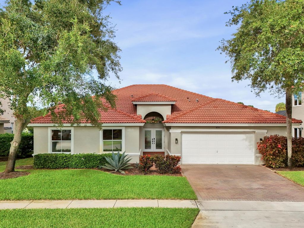 Photo of 6311 Shadow Tree Lane, Lake Worth, FL 33463 (MLS # R11128538)