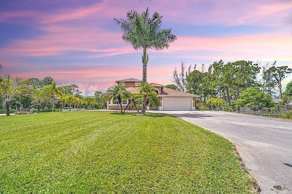 Photo of 11538 Persimmon Blvd, West Palm Beach, FL 33411 (MLS # F10372832)