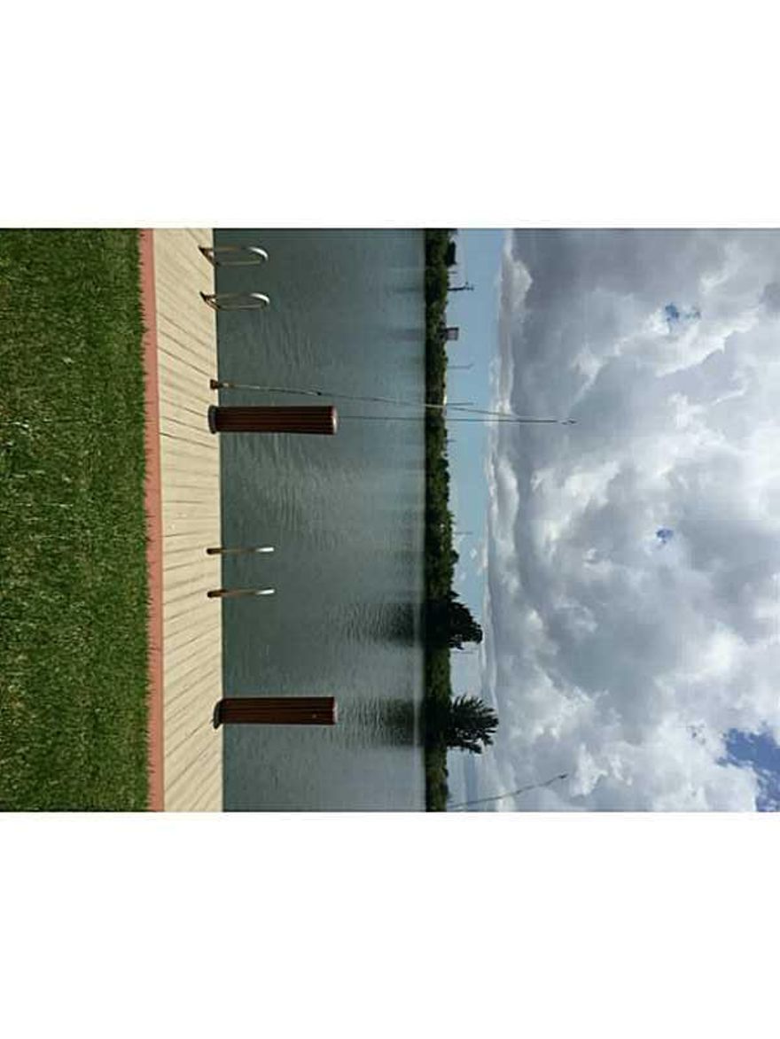 UPDATED 2 LEVEL TOWNHOUSE DIRECTLY ON CRYSTAL LAKE. SMALL BOAT OR JET SKI DOCKAGE IS AVAILABLE. YOU CAN PADDLE BOARD DIRECTLY IN FRONT OF THIS UNIT ON THIS LARGE RECREATIONAL LAKE. WASHER/DRYER IN UNIT. ALL TILE FLOORS. CLOSE TO SHOPPING AND MAJOR HIGHWAY S. WATCH THE WATERSPORTS FROM YOUR SCREENED IN PATIO. SMALL PETS ARE OK. ONLY FIRST MONTH AND SECURITY FOR QUALIFIED TENANTS.