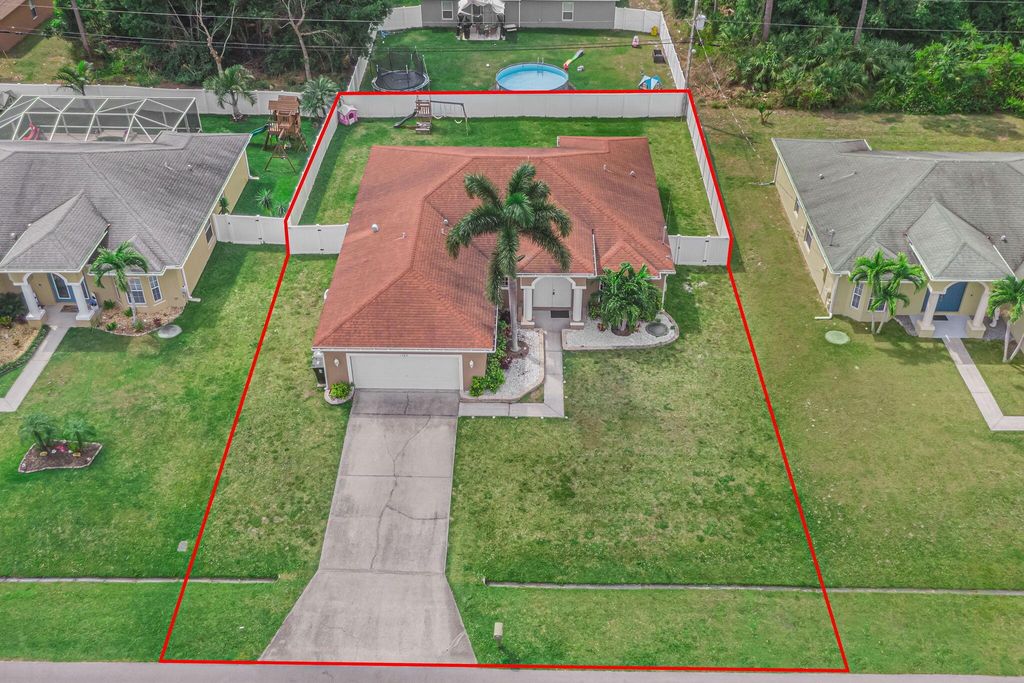 Photo of 1762 SW Sw Cycle St, Port Saint Lucie, FL 34953 (MLS # R10971242)