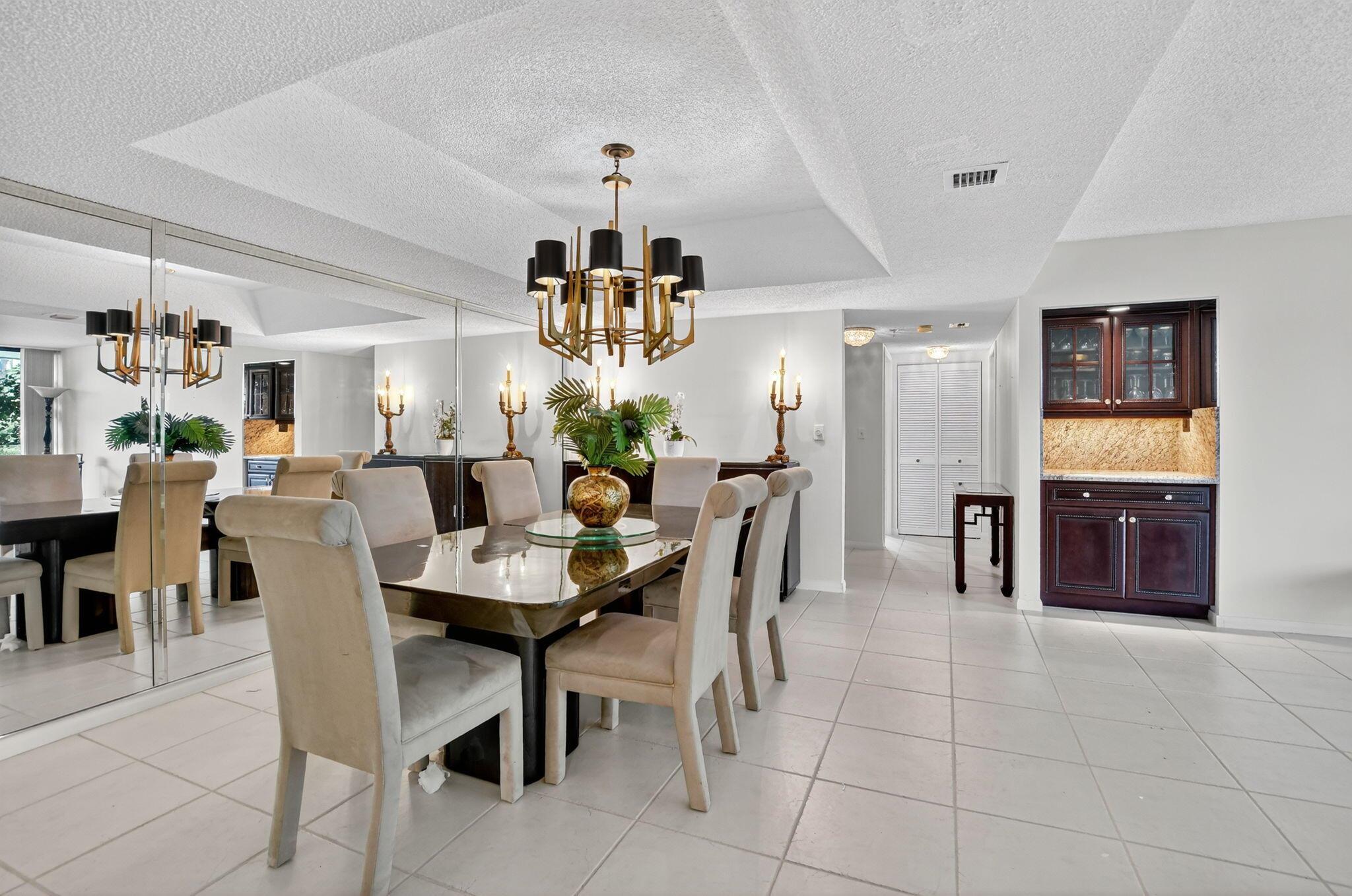Spacious Ground floor 2 bedroom 2 bath residence in Laurel Oaks. The building lobby has been fully renovated with a private social room. Residence has been updated and has a private entrance through the back patio. ~ Imagine life inside the Nation's #1 Private Residential Country Club Lifestyle offering resort-style living. Conveniently located less than 10 minutes from downtown Boca Raton. PLAY our 4 Golf courses, 27 Tennis courts and 14 Pickleball courts; SHOP our retail store, golf and tennis pro shops, DINE in our 8 dining venues. Spend the day RELAXING at our 5-star fitness center, pool, spa and salon. ENJOY endless activities in over 450,000 sq. ft. of exceptional amenities & stellar service. Mandatory Joining Fee: $150,000, BWMA Capital Contribution: $10,000, Annual Social Dues