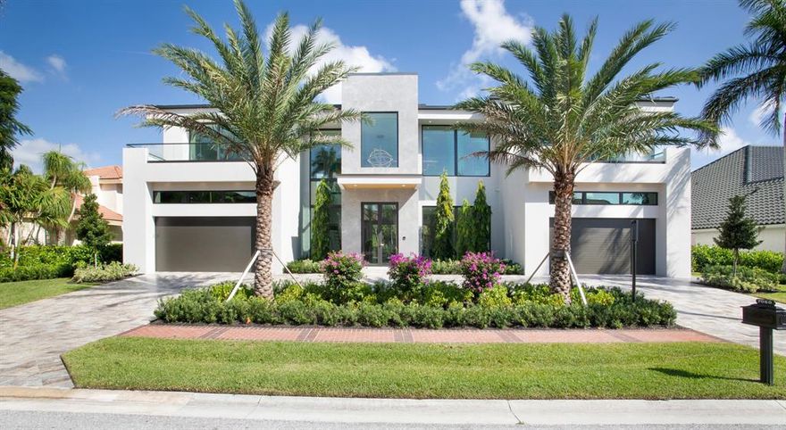 New construction. This impeccably designed modern masterpiece is stunning in both scale and sophistication, featuring 6 bedrooms, 7 full bathrooms and 3 half bathrooms spanning over 8,100 sq ft. Offering gallery like spaces that are both expansive & intimate. An architecturally significant floating staircase & elevator connect the two levels. The upper level houses 4 en-suite bedrooms with stunning golf course and park vistas, utility, club room, multiple entertaining spaces, and tremendous balconies. The home's main level features show room garages, a breath taking glass office, designer kitchen, multiple living areas, master bedroom with 2 closets and 2 designer bathrooms, a 24 ft grand foyer, staff quarters and a water vapor fireplace. Other features include poured concrete second floor, hurricane impact windows and doors, full house generator, elevator, and four car garage. Enjoy a resort style pool and Italian marbled entertainment lanai with an expansive summer kitchen. The spectacular interiors were masterfully designed and boast an array of coveted finishes of the highest quality. This estate stands out as a rare architectural gem that offers unparalleled attention to detail.