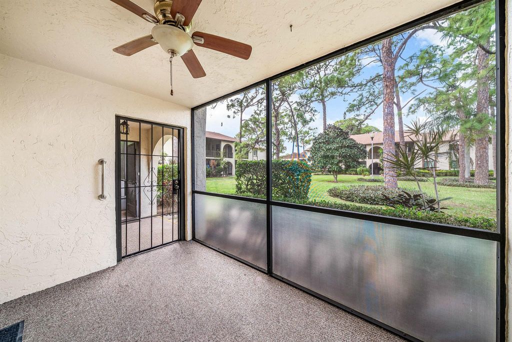 Photo of 325 Knotty Pine Circle #C-1, Greenacres, FL 33463 (MLS # R11150210)