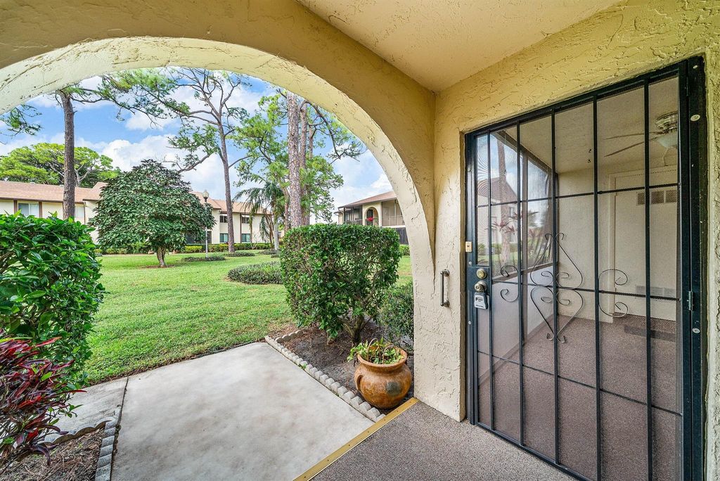 Photo of 325 Knotty Pine Circle #C-1, Greenacres, FL 33463 (MLS # R11150210)