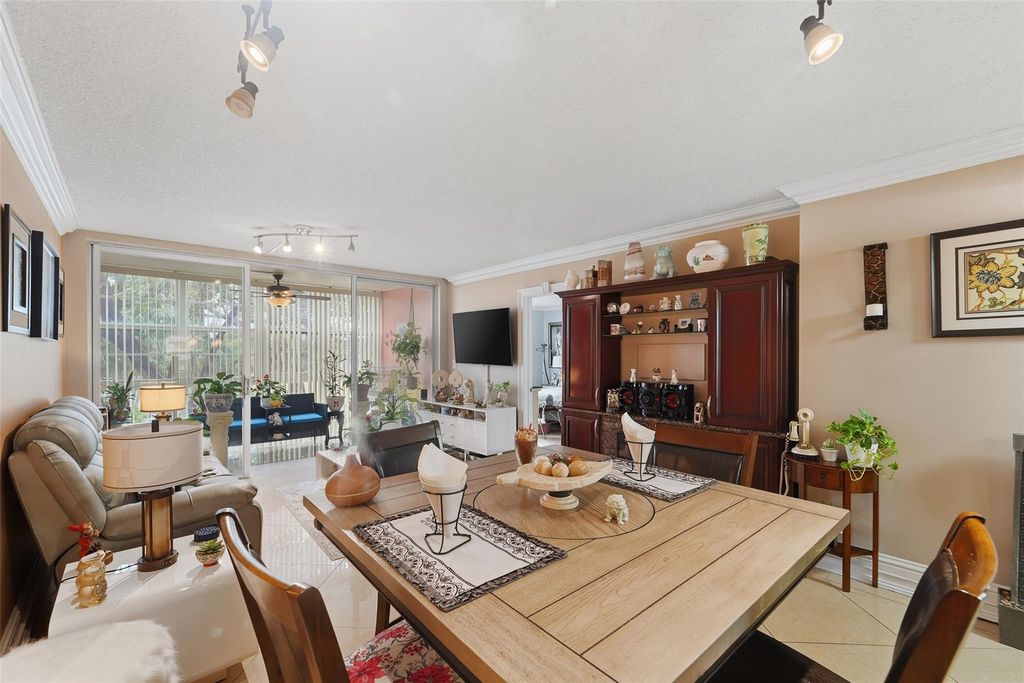 Photo of 5750 NW 64th Avenue #211, Tamarac, FL 33319 (MLS # F10548234)