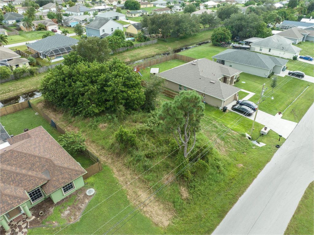 Photo of 3485 SW Voyager Street, Port St Lucie, FL 34953 (MLS # R10926604)