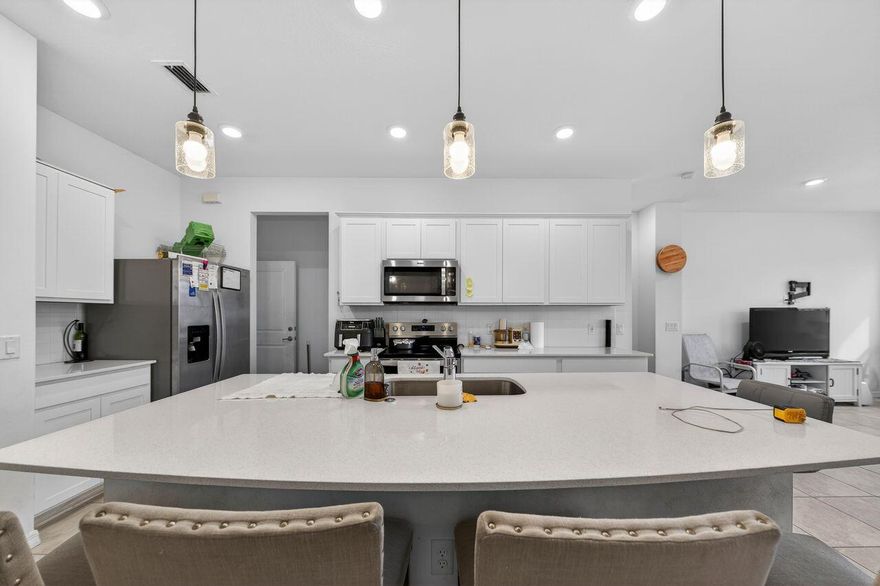 Welcome to your dream home in the highly sought-after Ranchette Square community, Nestled in the picturesque Greenacres, FL. This beautiful townhome offers the perfect blend of comfort, convenience, and luxury living. Step into elegance with this three-bedroom, Two and half-bathroom townhome boasting a contemporary design and impeccable attention to detail. Enjoy peace of mind with all major components in like- new condition to ensure a comfortable and worry-free lifestyle. This home is one of the few in the community to be situated on the serene lake, offering a private back patio where you can savor your morning coffee. Don't miss out on the opportunity to make this exquisite townhome your own.