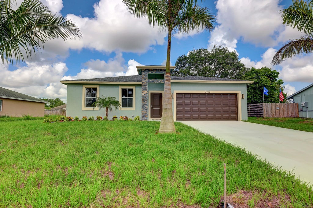Photo of 2052 SW Greenan Lane, Port Saint Lucie, FL 34953 (MLS # R10816312)