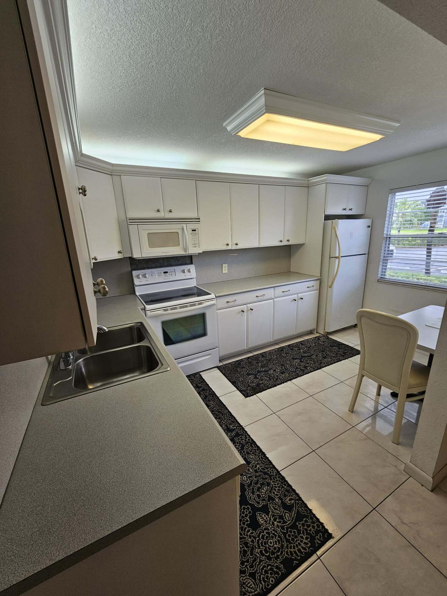 NEWCASTLE AT CENTURY VILLAGE CONDO - Residential