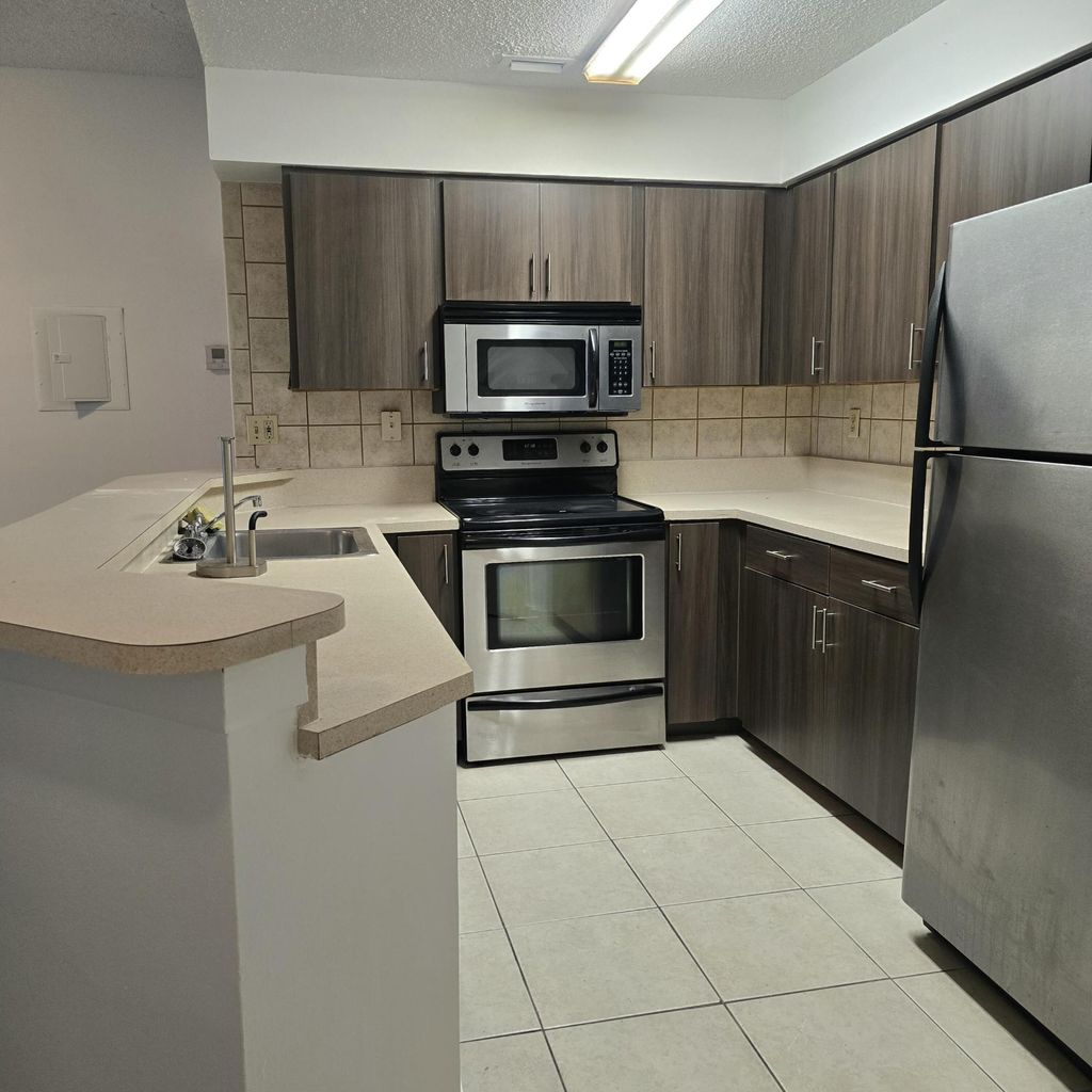Photo of 2445 SW 18th Terrace #902, Fort Lauderdale, FL 33315 (MLS # B26032141)