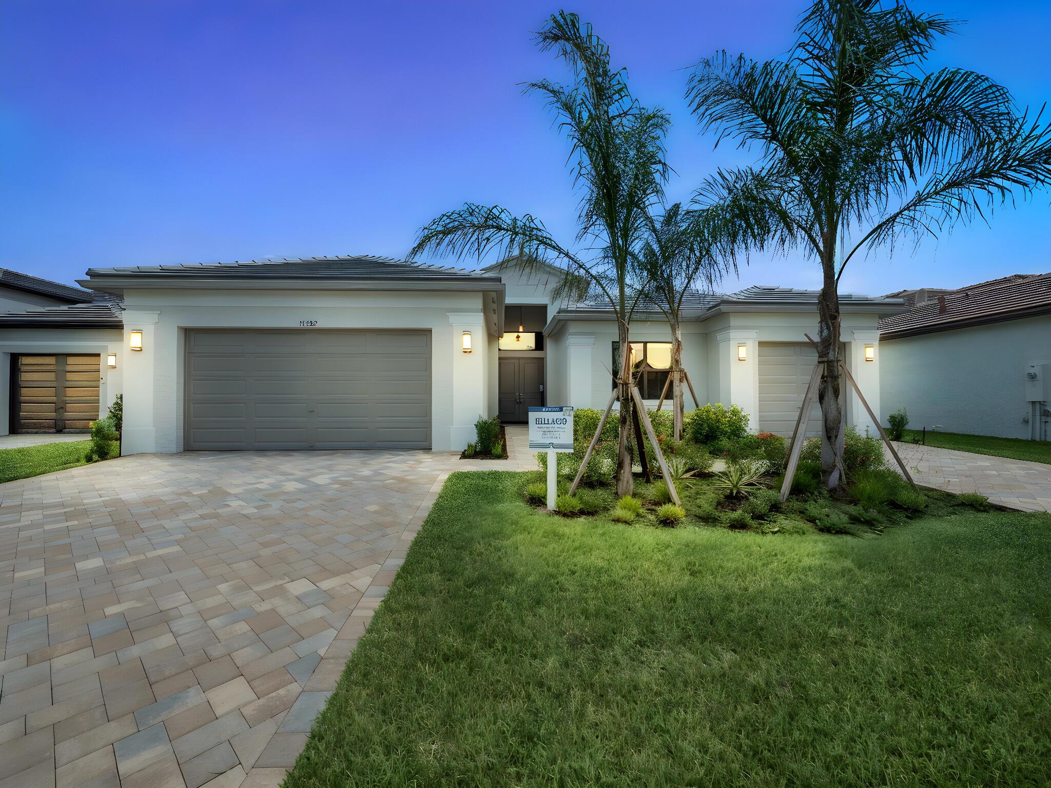 Valencia Walk at Riverland is where you'll find Port St. Lucie's best 55+ lifestyle with a million ways to have fun including a beautiful 37,000-square foot Clubhouse with resort-style amenities. This highly sought-after Bellagio floor plan includes private landscaped views and an open floor plan with contemporary porcelain 24''x24'' matte tile flooring throughout all the entire home. The home features high end finishes including impact glass windows, GE gas appliances, tile roof, and recessed LED lighting. The chef's kitchen includes contemporary quartz countertops with full quartz backsplash, painted 2-tone white and grey maple, shaker style cabinets, custom cabinet pantry built-in, and GE stainless-steel appliances include chimney style hood. All luxury bathrooms include quartz