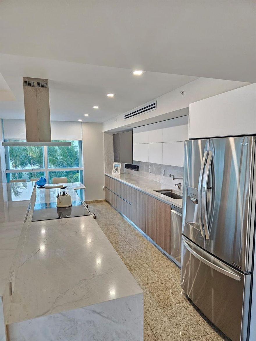 Experience Coastal Luxury at Its Finest Dream apartment located on the prestigious private island of Oceania | Sunny Isles Beach, FL. Enjoy the best of both worlds, the serenity of private island living and the vibrant energy of the coast, in this spectacular third-floor residence, ideal for those who appreciate breathtaking Intracoastal views without the need for great heights. This unit offers an exceptional vantage point for a third floor, perfect for those who value comfort and stability while still enjoying a stunning panoramic view of the water. Featuring 2,345 sq ft of interior space + 700 sq ft of private terraces, this elegant home offers: 3 spacious bedrooms, each with ensuite bath, private terrace, and beautiful Intracoastal views 3 parking spaces and an optional dock