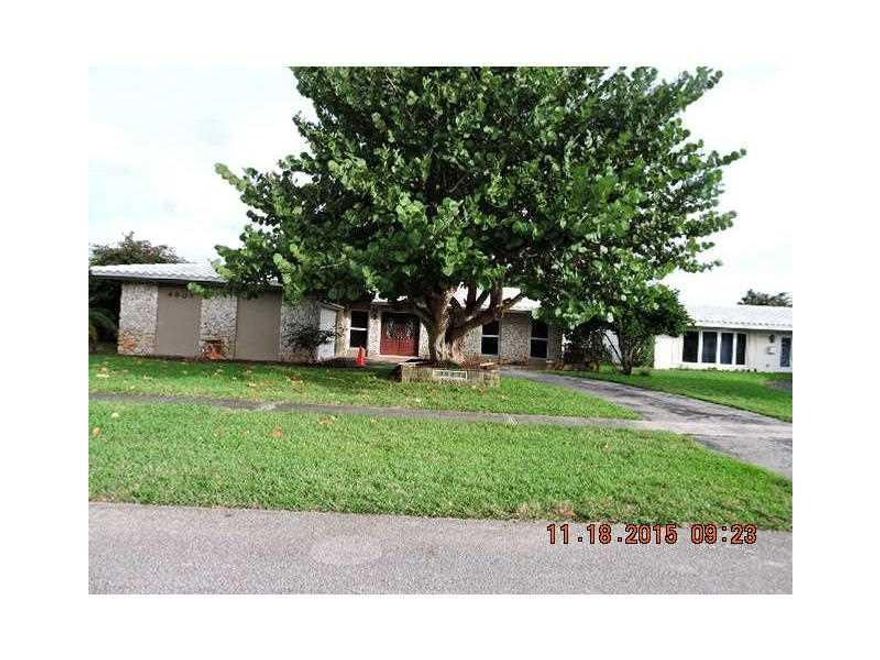 This is a rare opportunity to live in the prestigious Hollywood Hills area in your very own pool home with updated kitchen with granite counters. This large home has a seperate large formal dining room, living room and family room. The pool is screen encl osed and there is a spacious 2 car garage. This is a your opportunity knocking. Call your agent today to make an offer.