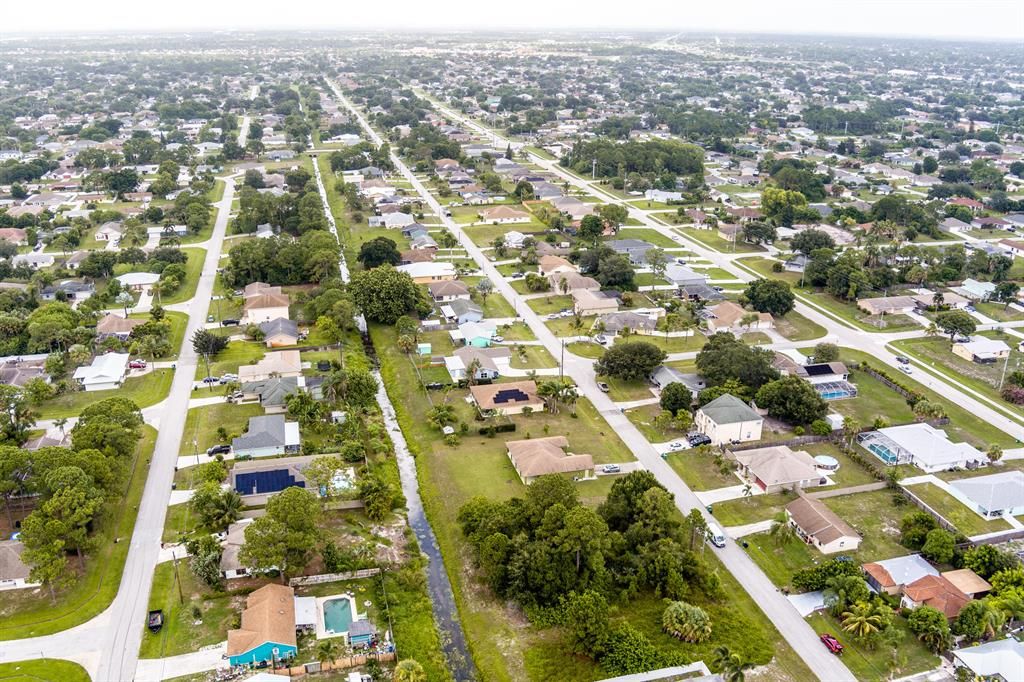 Photo of 2120 SW Idaho Lane Ln, Port Saint Lucie, FL 34953 (MLS # R10820250)