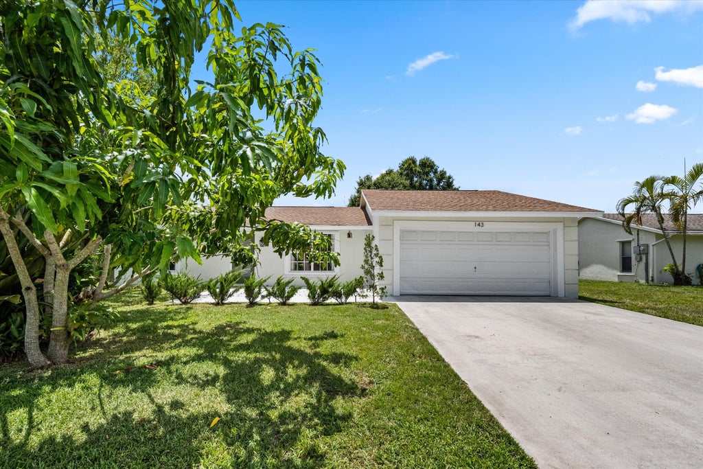 Photo of 143 Bobwhite Road, Royal Palm Beach, FL 33411 (MLS # B26058777)