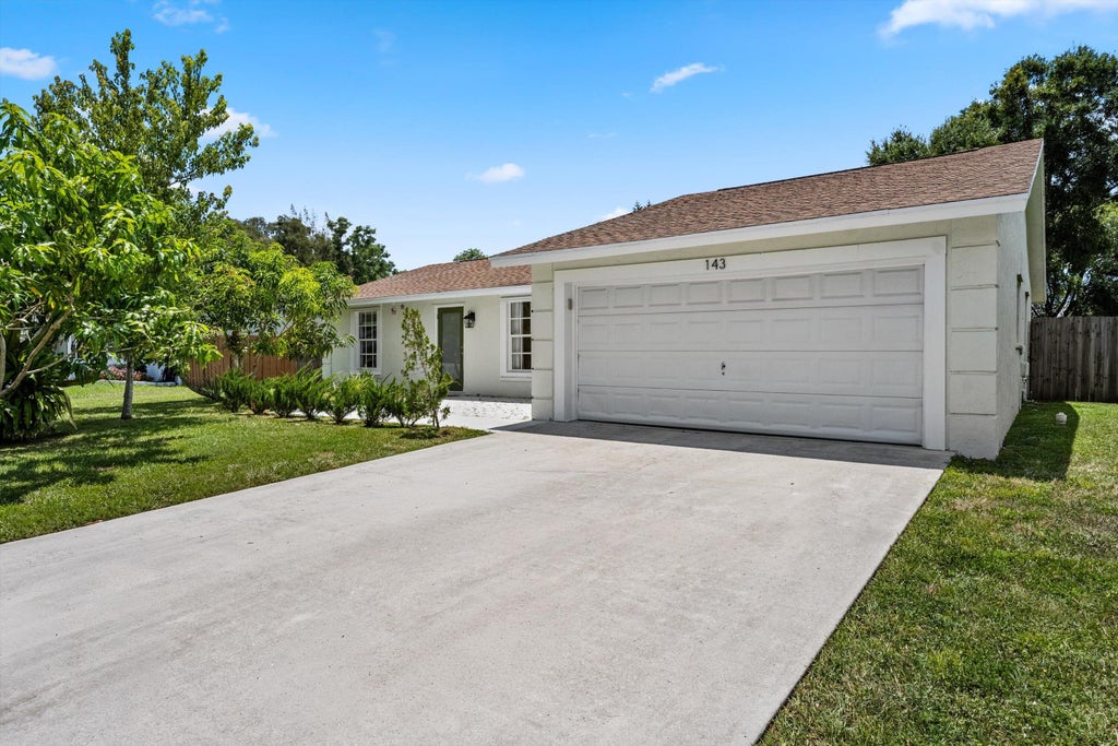 Photo of 143 Bobwhite Road, Royal Palm Beach, FL 33411 (MLS # B26058777)
