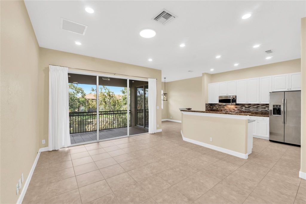 Photo of 8035 NW 127th Ln #3E, Parkland, FL 33076 (MLS # F10530217)