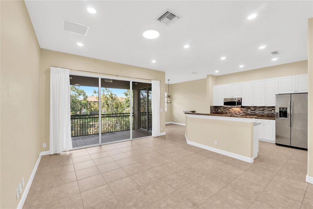 Photo of 8035 NW 127th Lane #3E, Parkland, FL 33076 (MLS # F10530217)