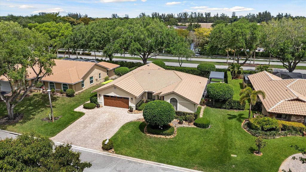 Photo of 8809 NW 55th Place, Coral Springs, FL 33067 (MLS # B26014963)