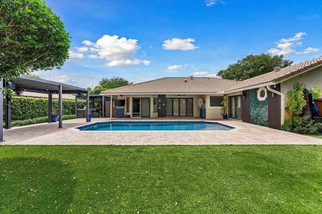 Photo of 8809 NW 55th Place, Coral Springs, FL 33067 (MLS # B26014963)