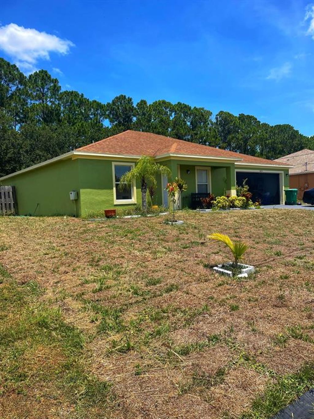 Photo of 4074 SW Hablow Street St, Port Saint Lucie, FL 34953 (MLS # R10815307)