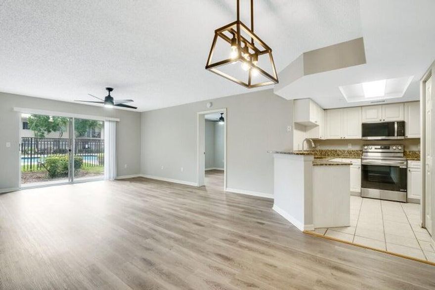 Located in the prestigious Grand View at Crestwood Complex. The gated community offers resort-type amenities such as 2 Pools, Fitness Center, Tennis Court, Playground, Kids Court, many Picnic Areas, Walk/Jog Trail, and 24h/7 Security Cameras. Centrally located between Southern and Okeechobee Blvd. We are near Turnpike, Equestrian facilities, Wellington Mall, Publix, Duffy's, Sal's Italian, Burger King, ABC Fine Wine, Walgreens, Hair Salon, Nail Salon, and much more. Come to see it before someone else takes it! Easy to show!