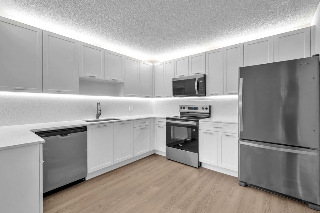 Photo of 4200 Community Drive, West Palm Beach, FL 33409 (MLS # B26003698)