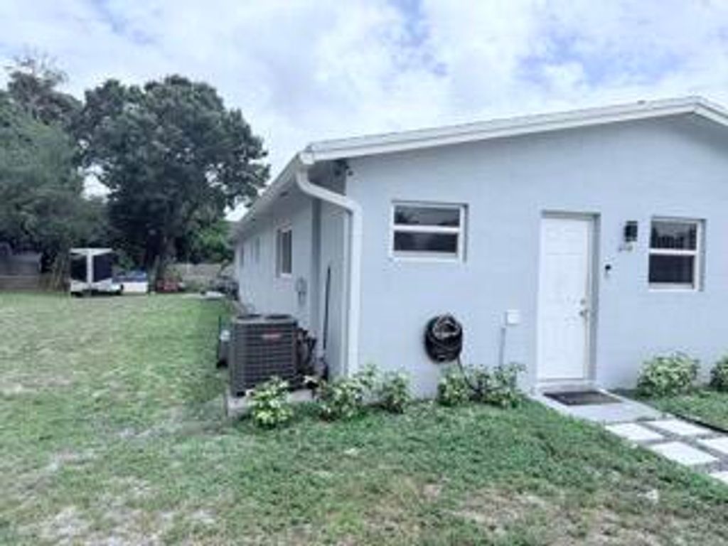 Photo of 2710 NW 24th Avenue #1-2, Oakland Park, FL 33311 (MLS # B26006407)