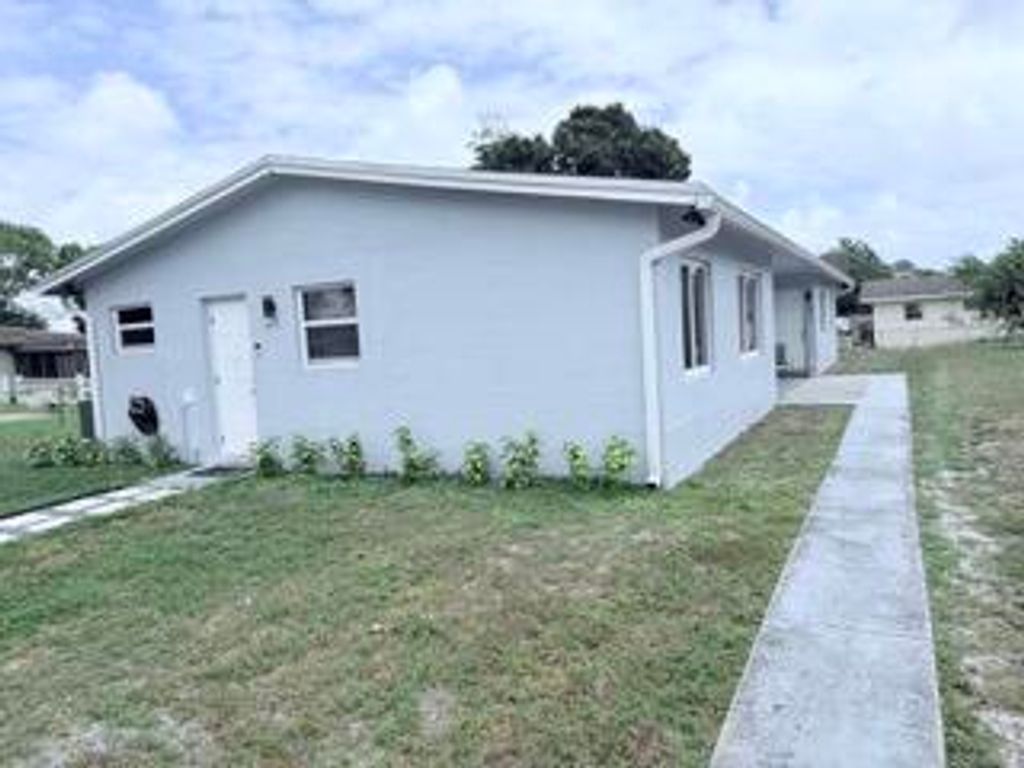 Photo of 2710 NW 24th Avenue #1-2, Oakland Park, FL 33311 (MLS # B26006407)
