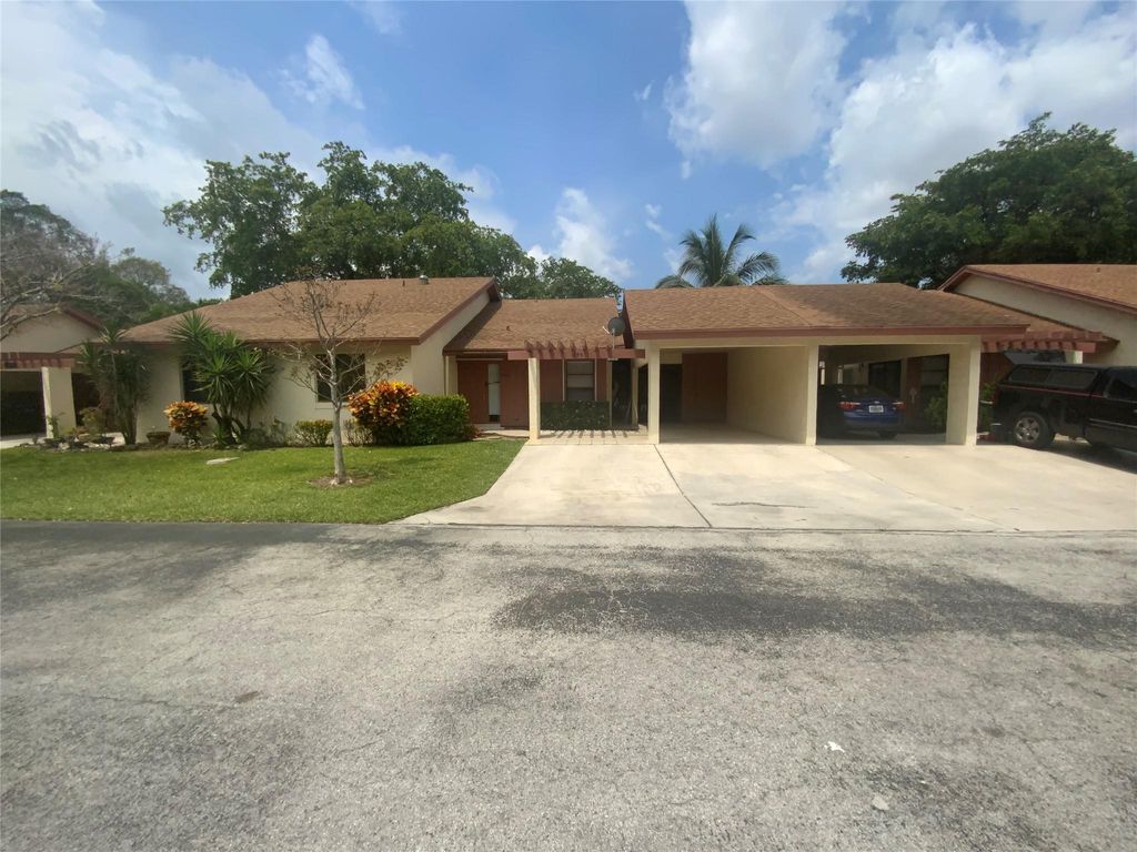 Photo of 1795 Satinwood Cr Circle #1795, Coconut Creek, FL 33063 (MLS # F10525634)