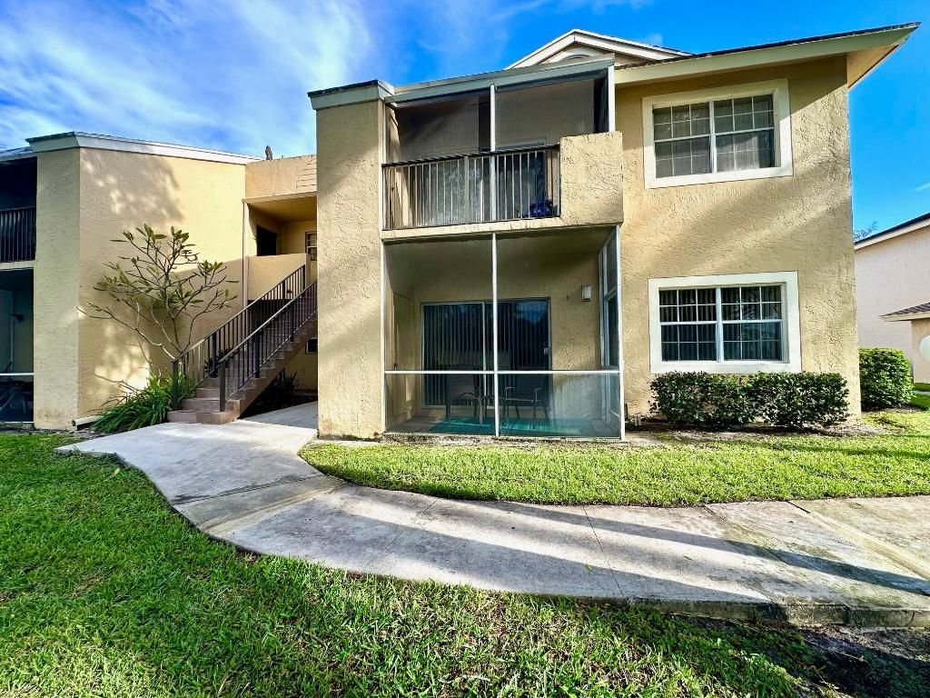Photo of 661 Cypress Lake Boulevard #F, Deerfield Beach, FL 33064 (MLS # R11136901)